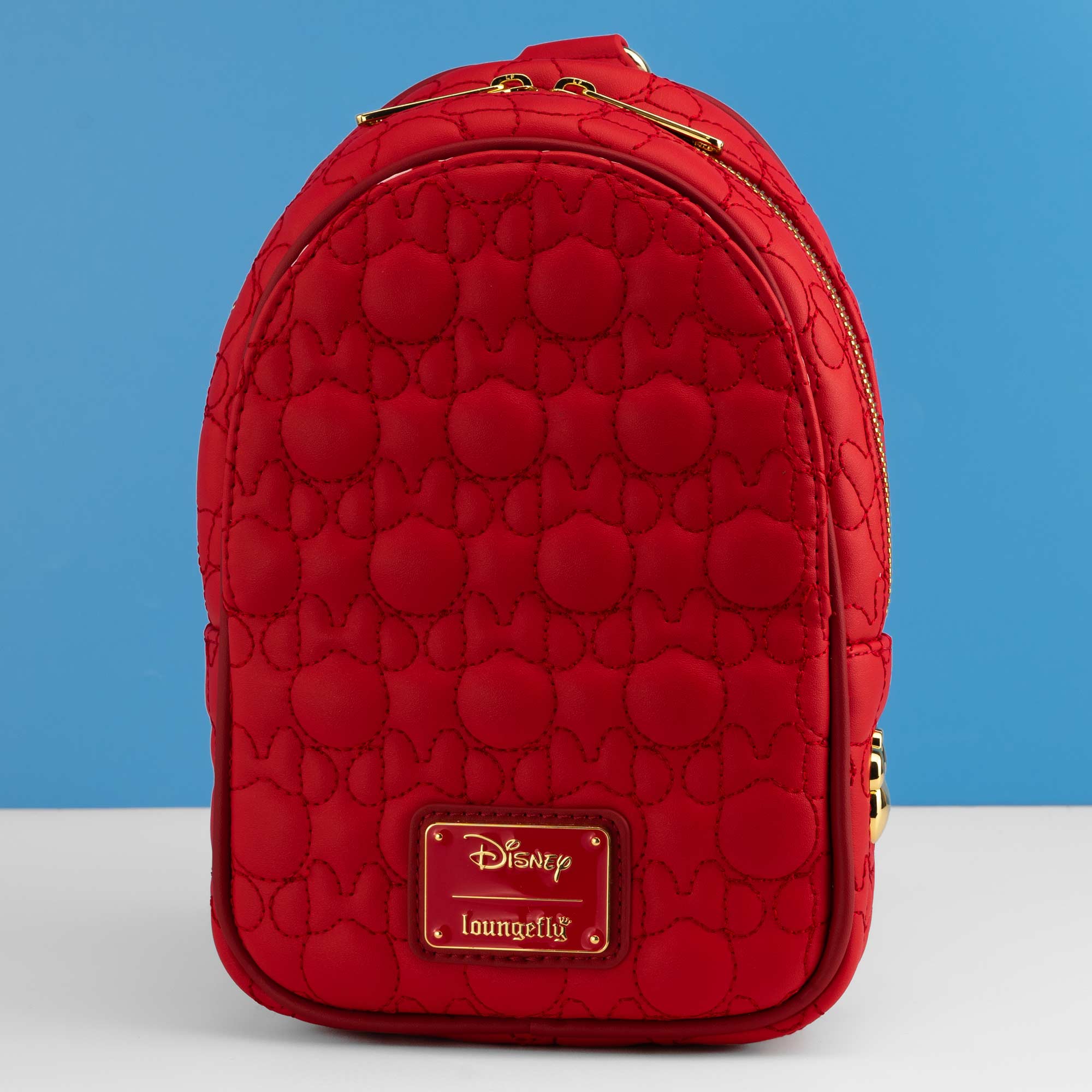 Loungefly x Disney Minnie Convertible Sling Bag
