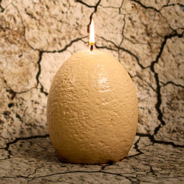 Hatching Velociraptor Candle - GeekCore