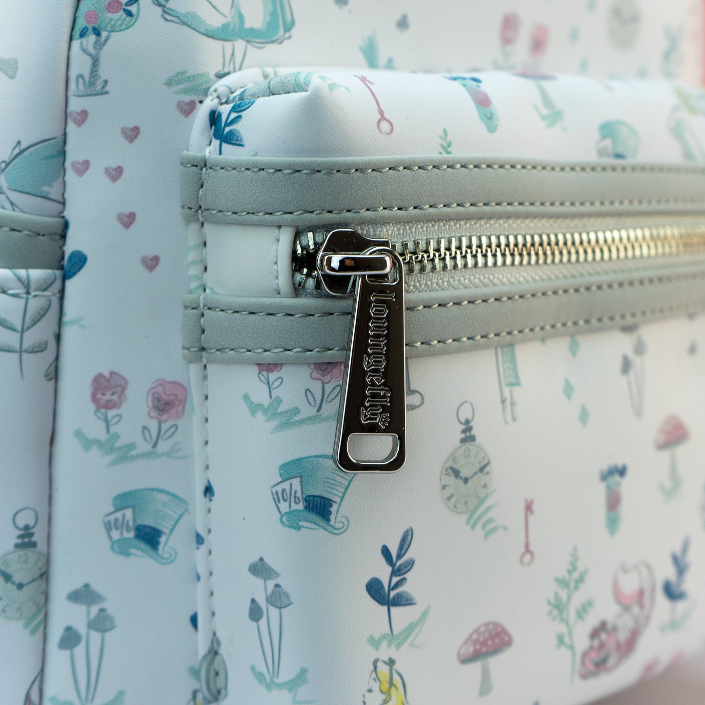 Loungefly x Disney Alice in Wonderland AOP Mini Backpack - GeekCore