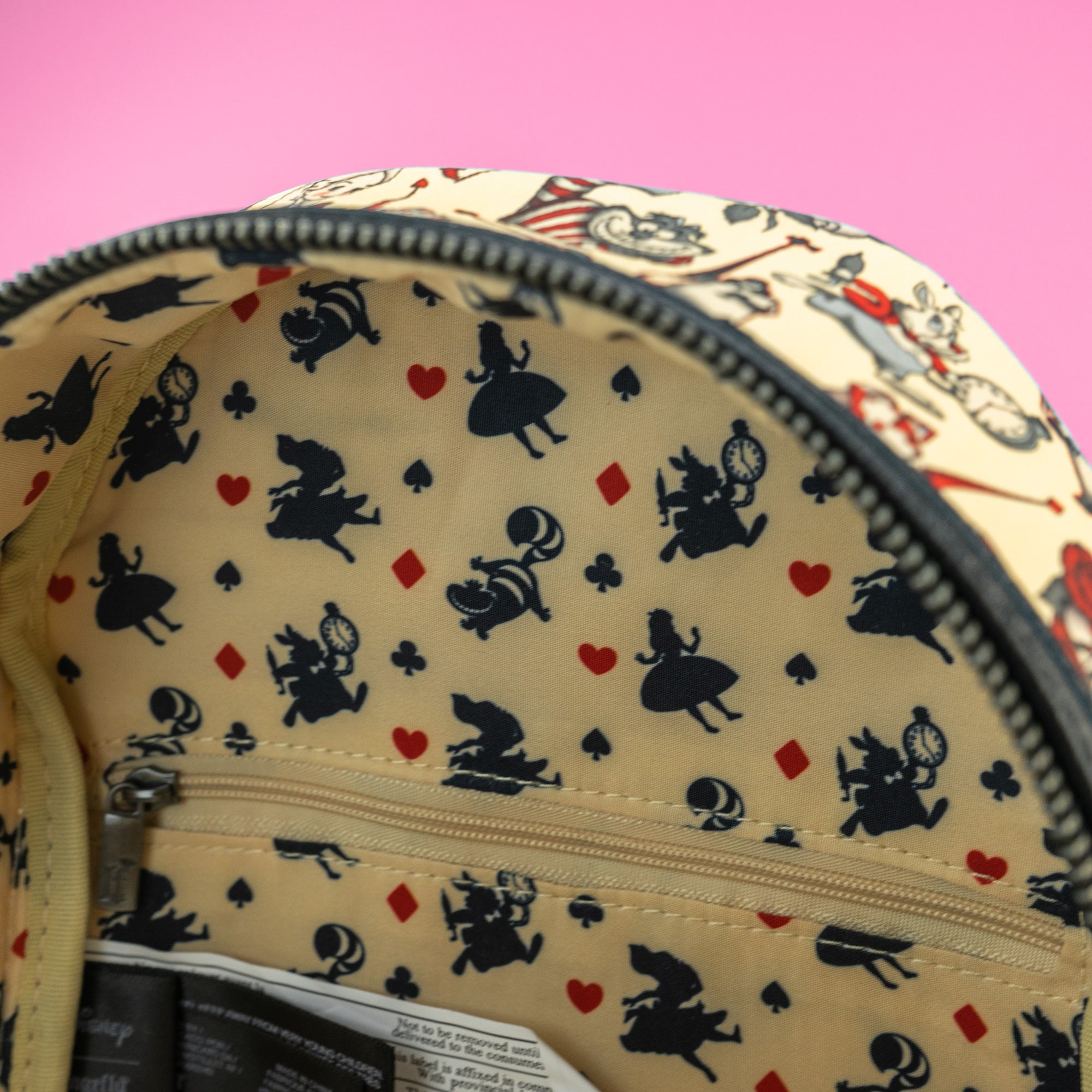 Loungefly x Disney Alice in Wonderland Tattoo Mini Backpack - GeekCore