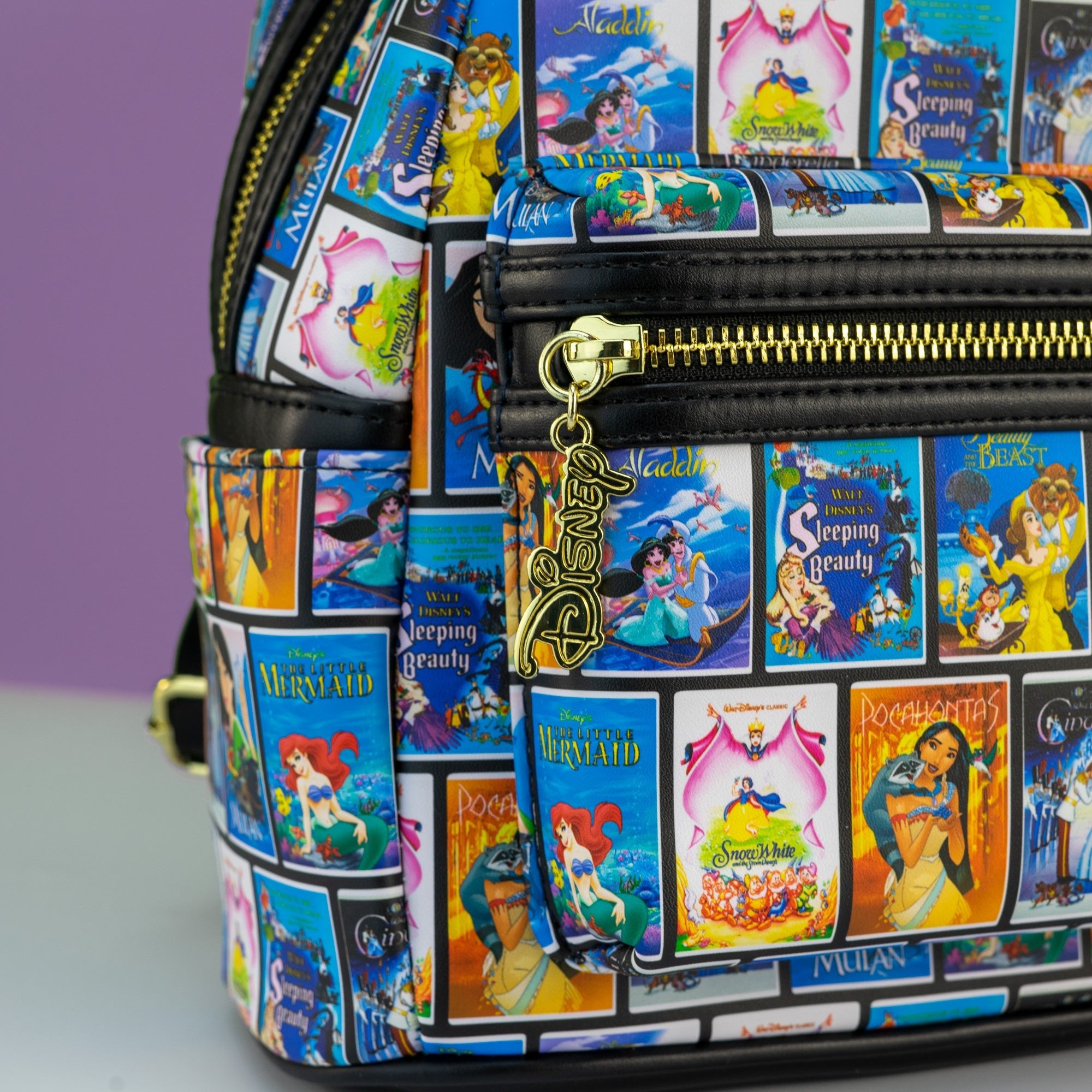 Loungefly x Disney Classic VHS Tape Film Covers Mini Backpack - GeekCore