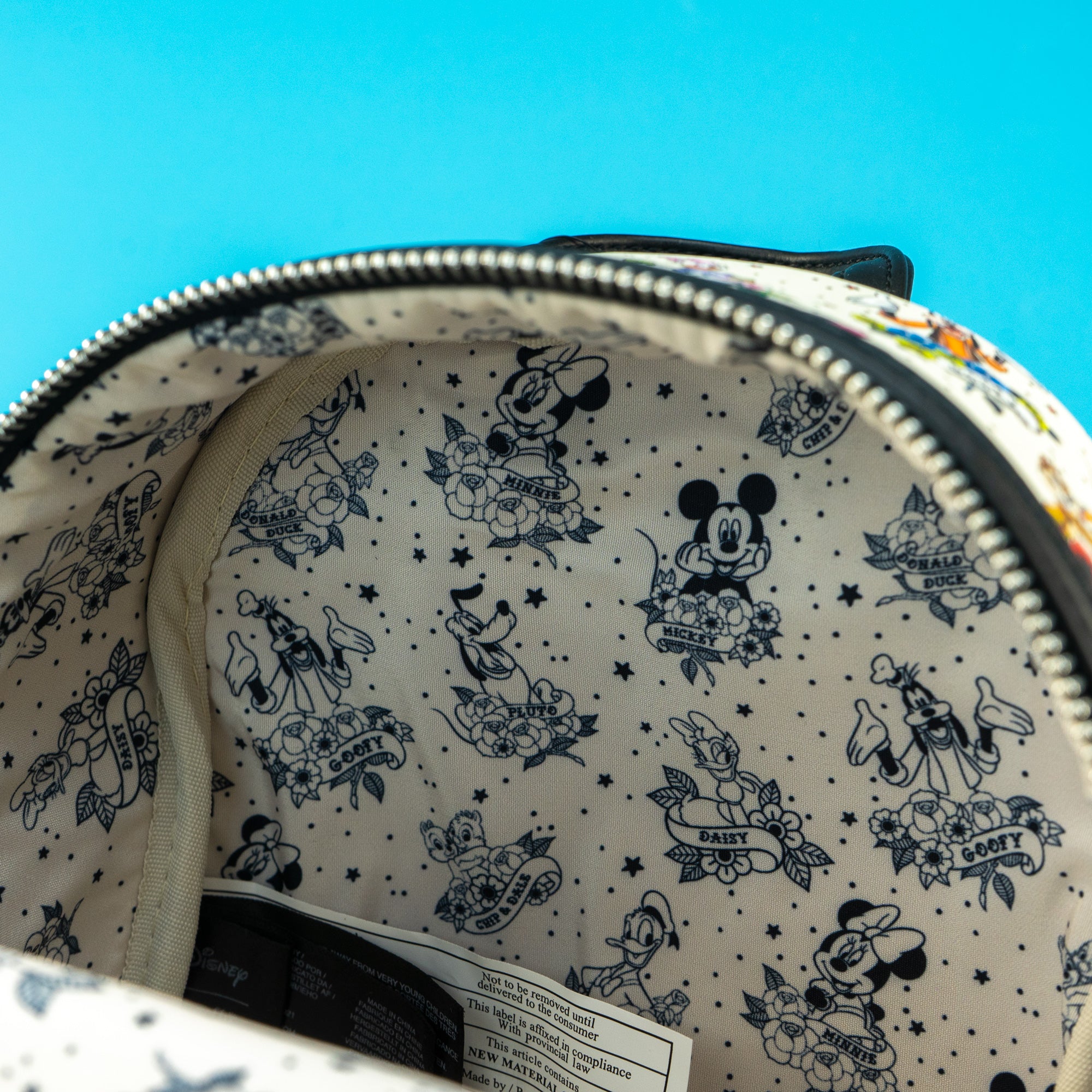 Loungefly x Disney Mickey and Friends Tattoo Mini Backpack - GeekCore