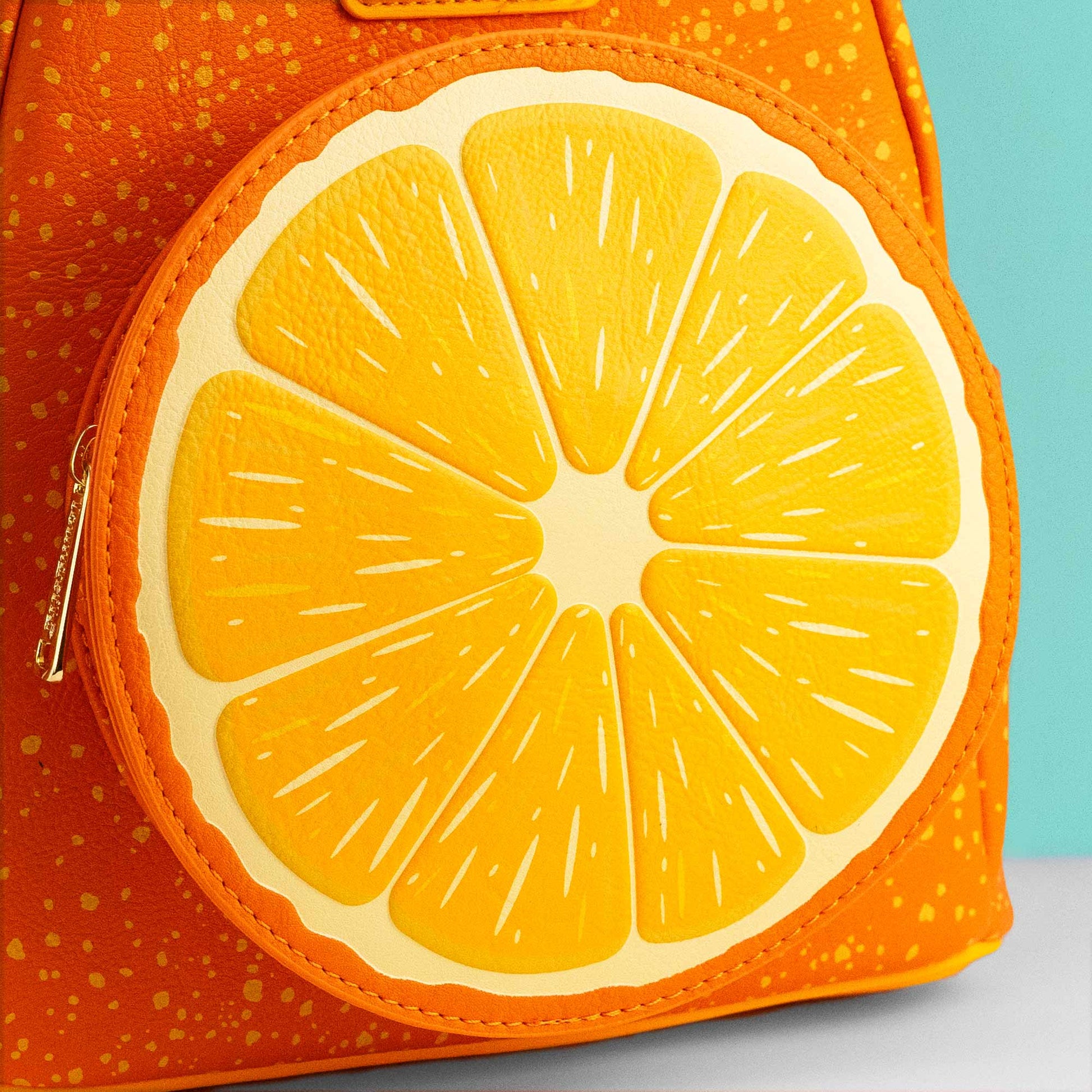 Loungefly x Disney Minnie Mouse Orange Scented Mini Backpack - GeekCore