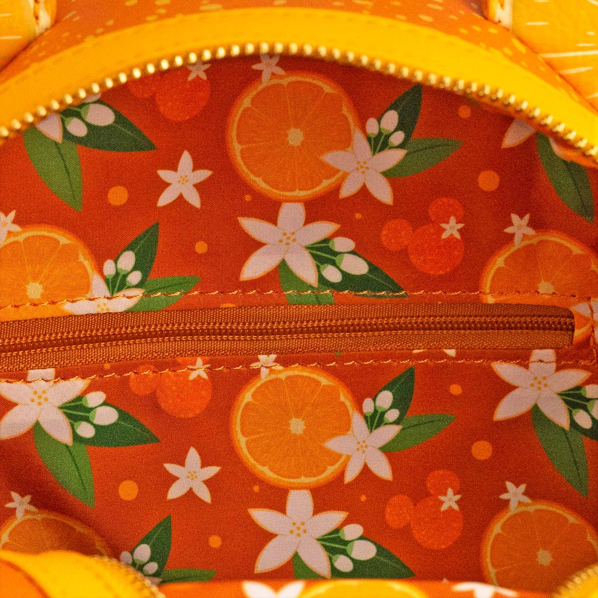 Loungefly x Disney Minnie Mouse Orange Scented Mini Backpack - GeekCore
