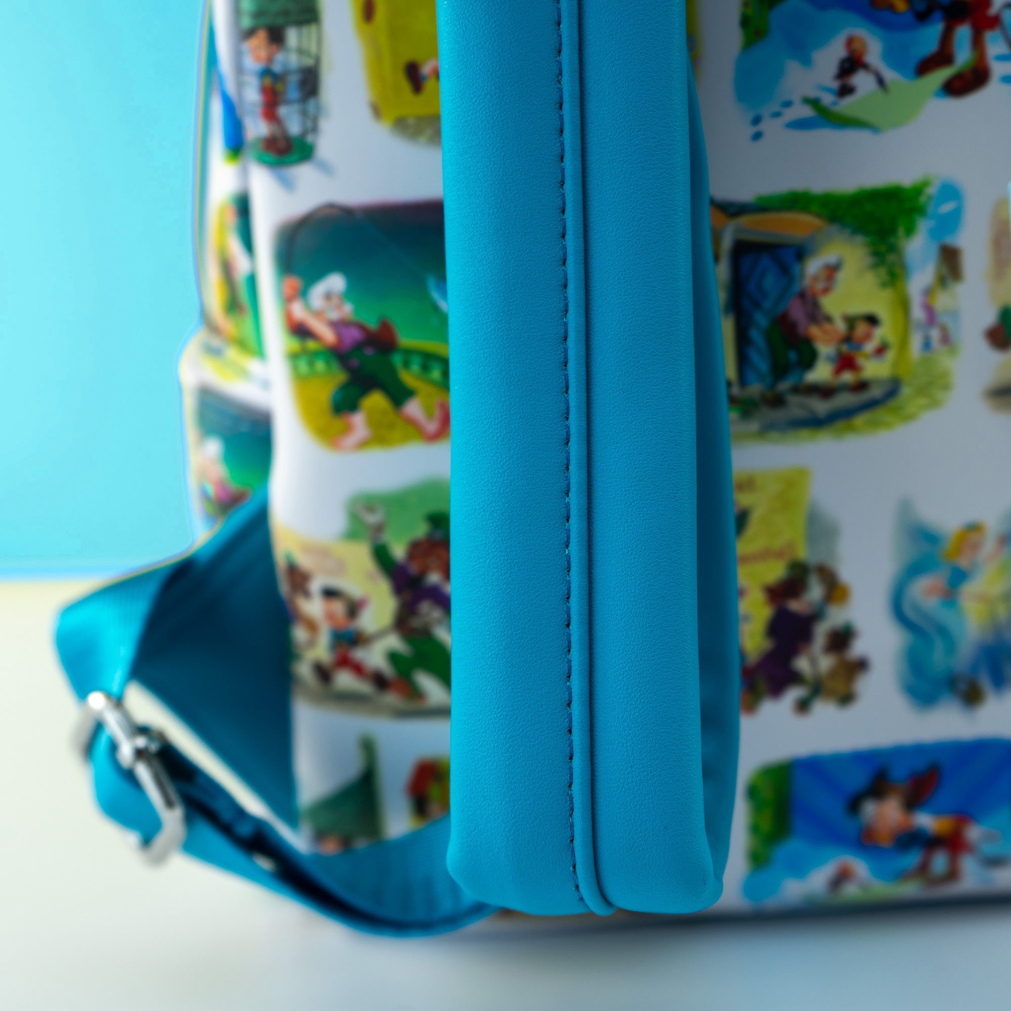 Loungefly x Disney Pinocchio Paintings AOP Mini Backpack - GeekCore