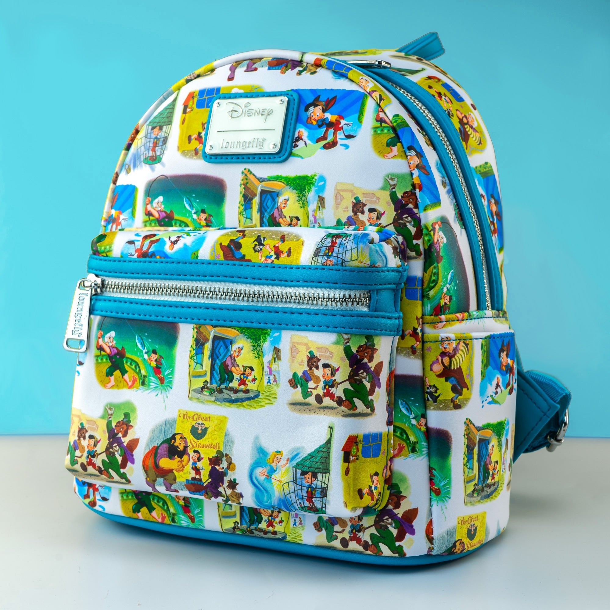 Loungefly x Disney Pinocchio Paintings AOP Mini Backpack - GeekCore