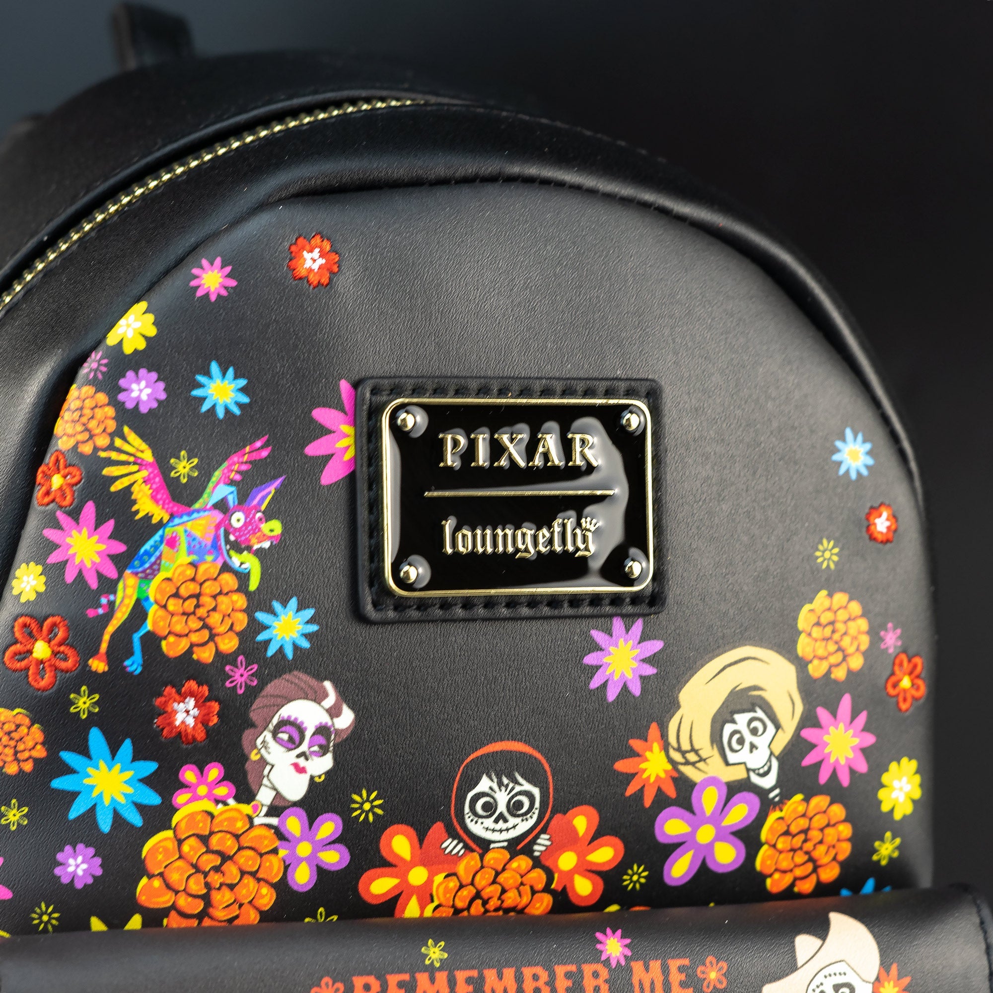 Loungefly x Disney Pixar Coco Remember Me Floral Mini Backpack - GeekCore