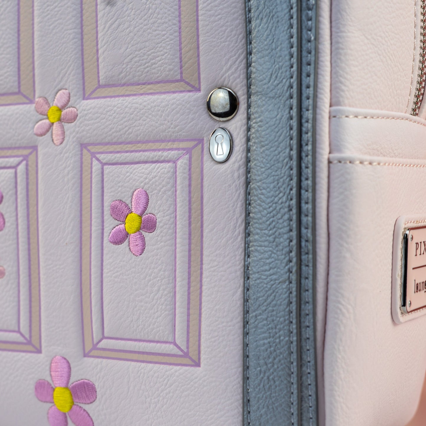 Loungefly x Disney Pixar Monsters Inc Light Up Boo's Door Mini Backpack - GeekCore