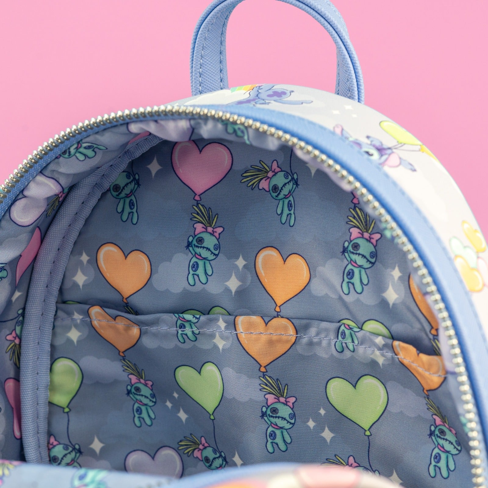 Loungefly x Disney Stitch Rainbows and Heart Balloons All Over Print Mini Backpack - GeekCore