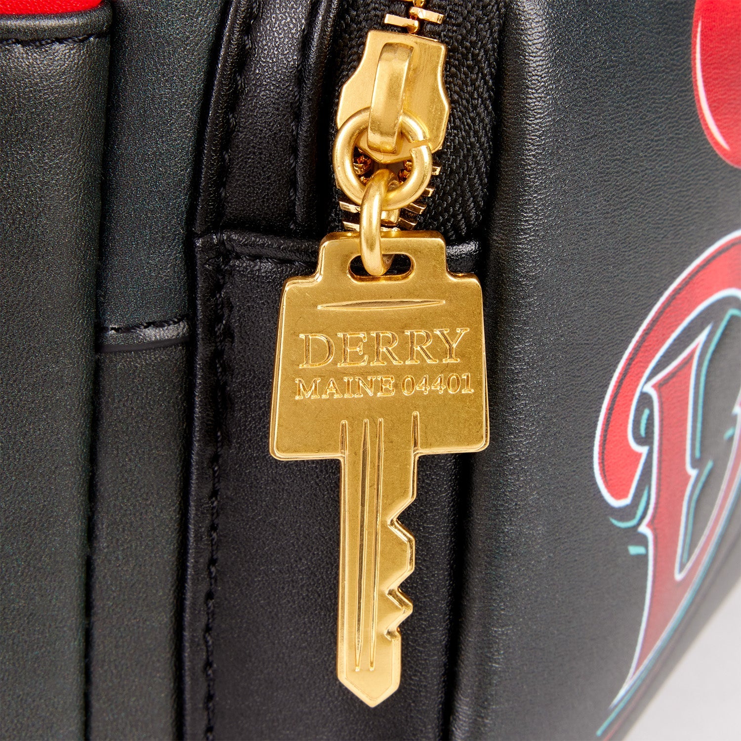 Loungefly x IT Pennywise Derry Sign Light Up Mini Backpack - GeekCore