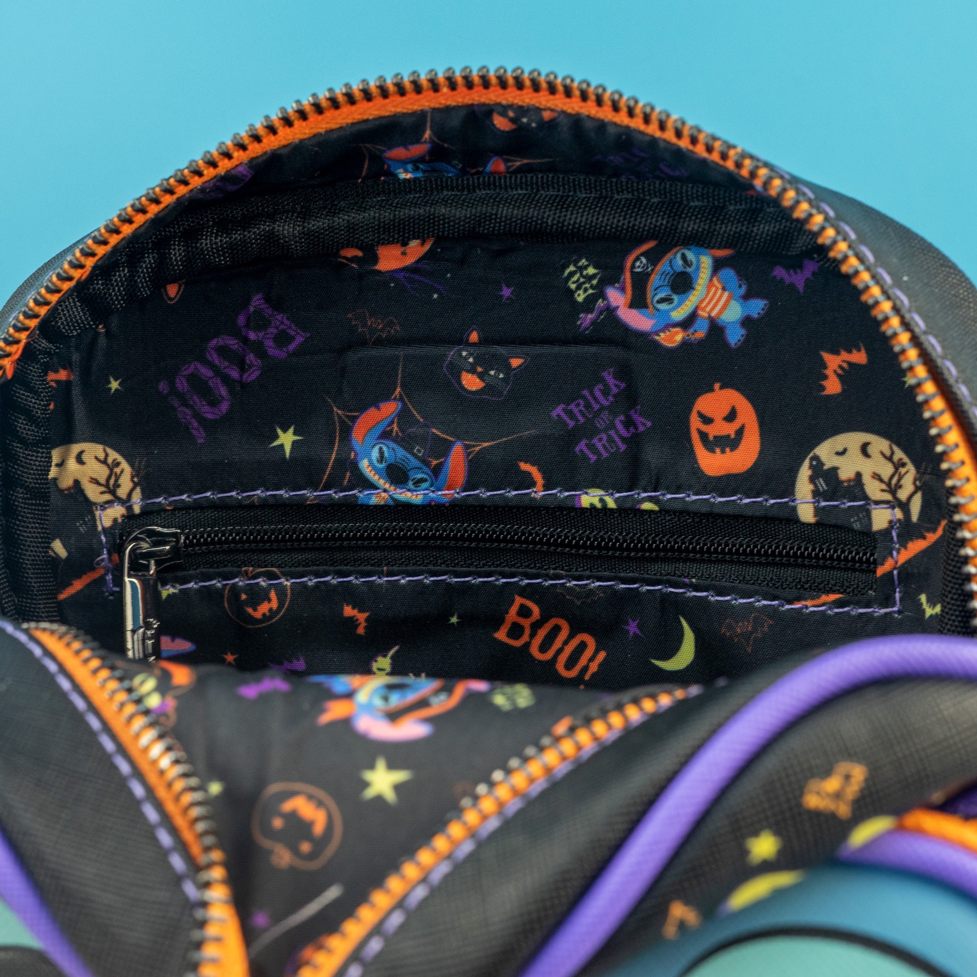 Loungefly x Lilo and Stitch Glow in the Dark Halloween Stitch Cosplay Passport Bag - GeekCore