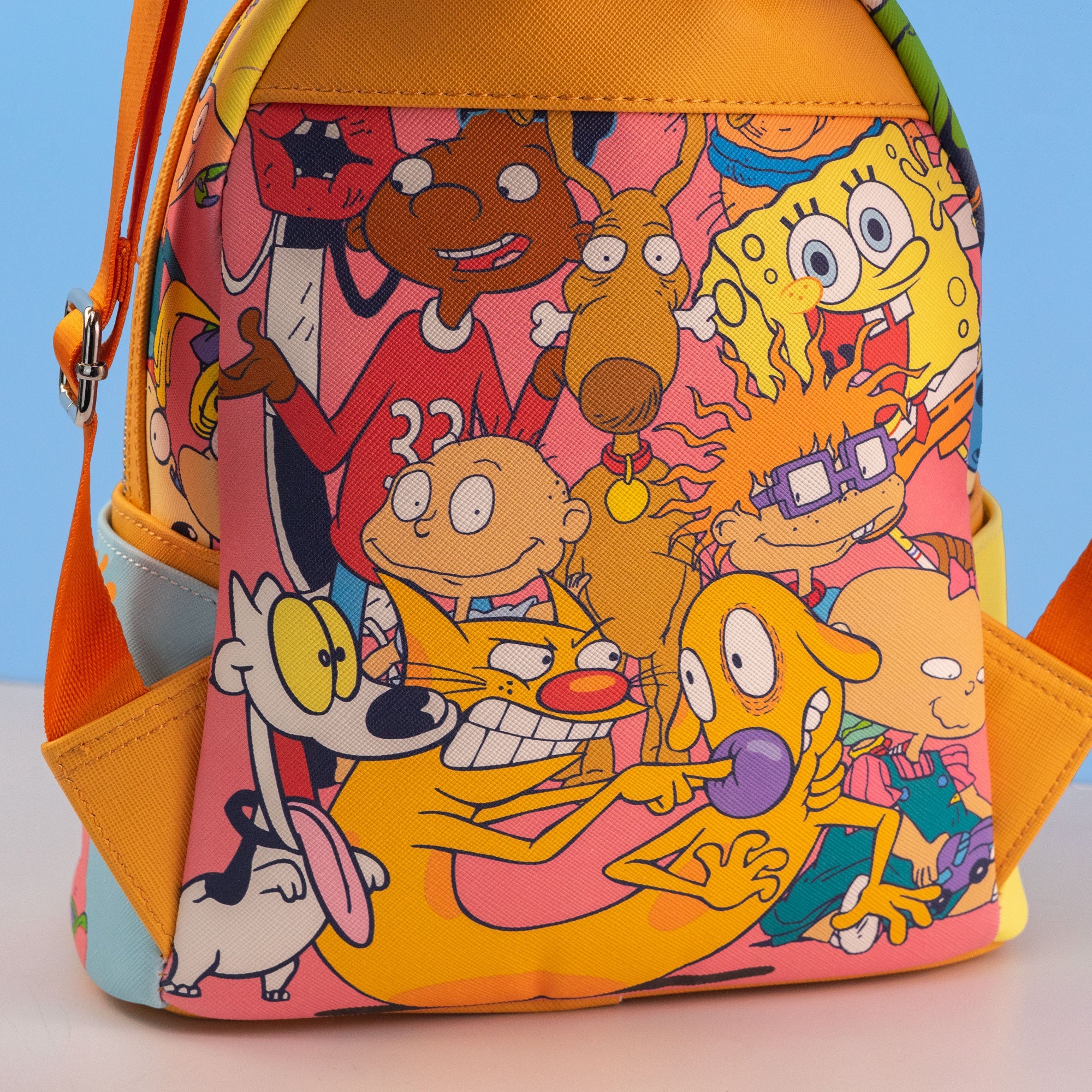 Loungefly x Nickelodeon Nick 90s Colour Block AOP Mini Backpack - GeekCore