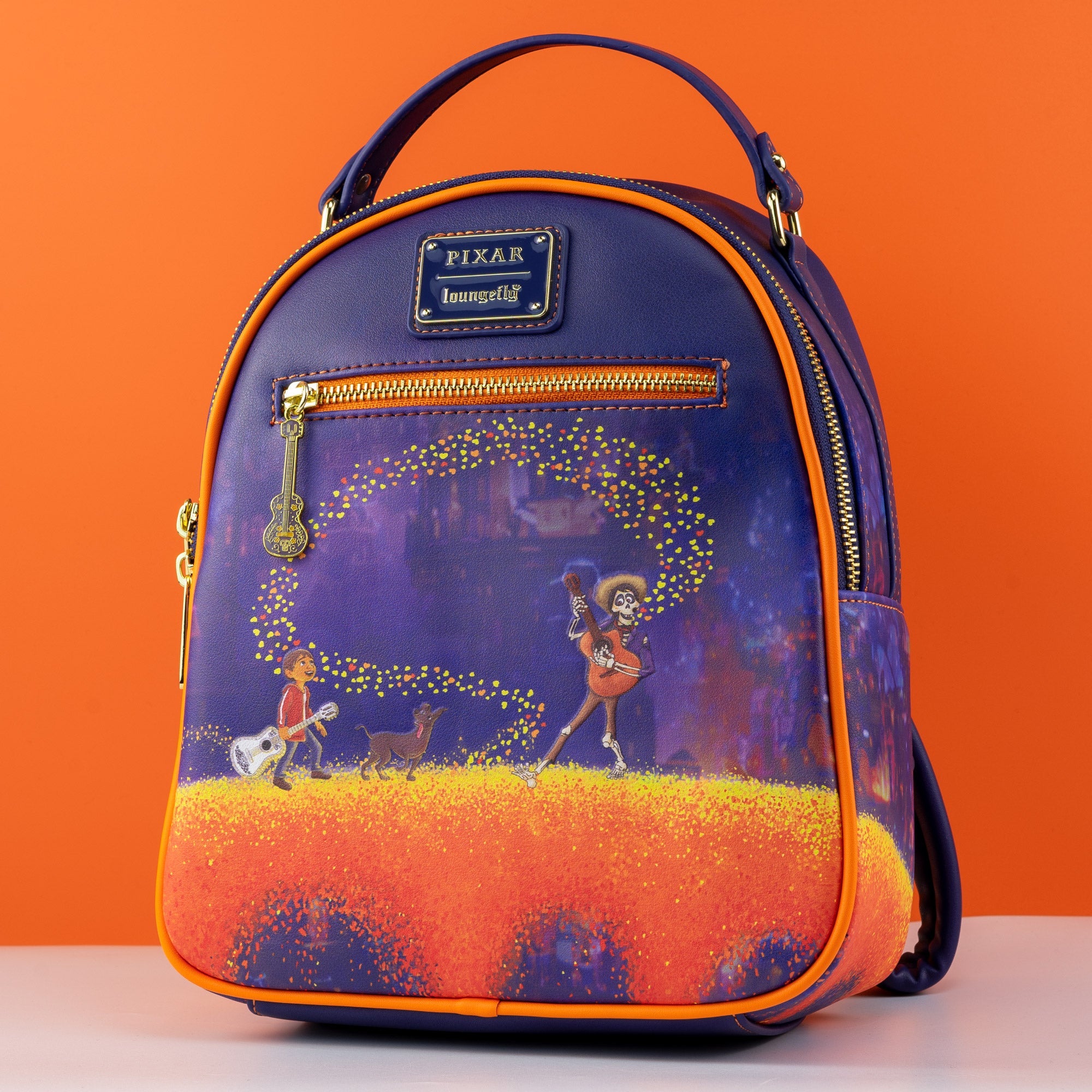 Loungefly x Pixar Coco Marigold Bridge Mini Backpack - GeekCore