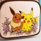 Loungefly x Pokemon Pikachu & Eevee Floral Pokeball Crossbody - GeekCore